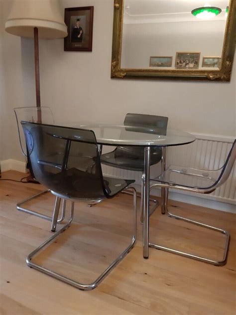 Ikea glass dining table & 4 chairs. | in Wimbledon, London | Gumtree