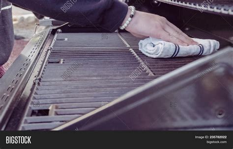 Cleaning Gas Grill Image & Photo (Free Trial) | Bigstock