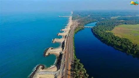 MARAVANTHE BEACH: On one side of road is river, Other side is Arabian ...