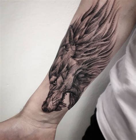 Wolf Tattoo on Forearm by Rowes Binley