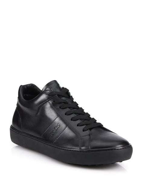 Tod's Solid Leather Sneakers in Black for Men | Lyst