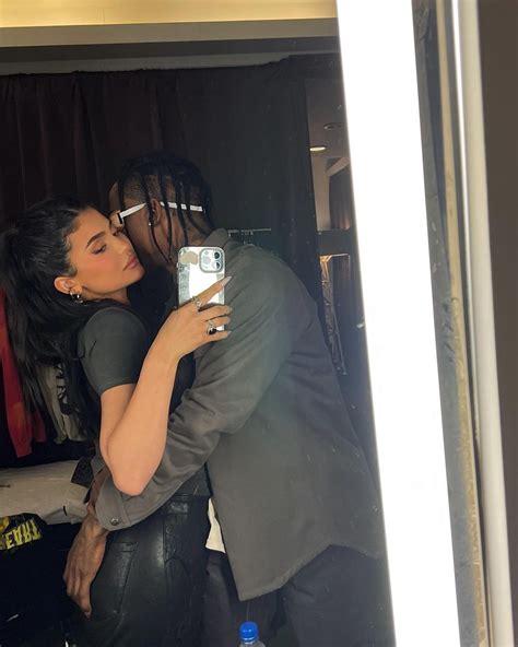 Kylie Jenner and Travis Scott show PDA backstage