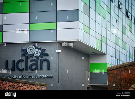 Student walking into Exterior building of the Preston Campus of UCLAN ...