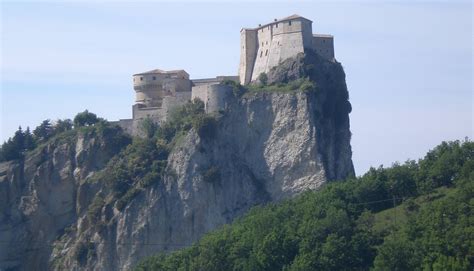 San Leo, Italy. This village built on a plateau is protected by sheer ...