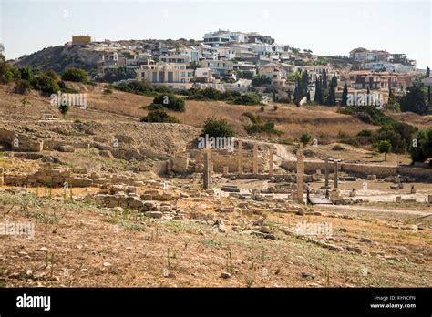 Ruins of Amathus ancient city with modern residential houses in ...