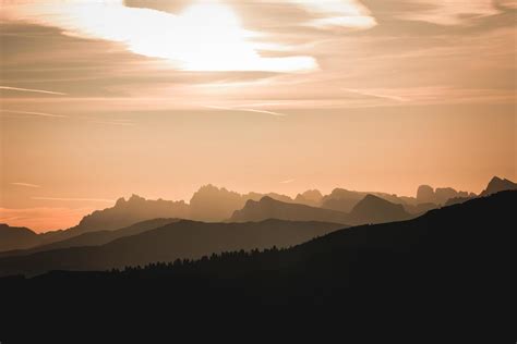 Silhouette of mountains during sunset 1416100 Stock Photo at Vecteezy