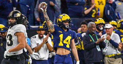 Michigan wide receiver Roman Wilson in locker room early against TCU - On3