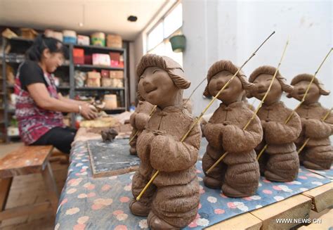 In pics: Sanchizhai clay sculpture N China - Xinhua | English.news.cn