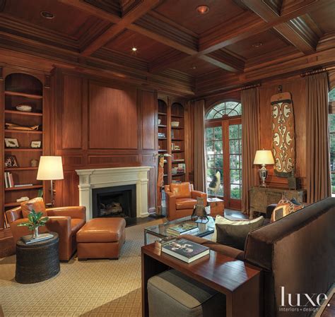 Traditional Chestnut-Paneled Library - Luxe Interiors + Design