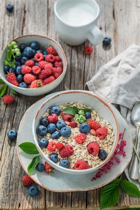 Granola with Milk and Fresh Berry Fruits in Blue Bowl Stock Image - Image of grain, fresh: 116530157