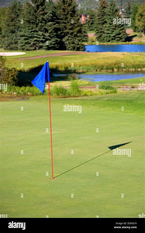 Flag on a Golf Green Stock Photo - Alamy