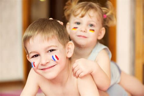 Cute Toddlers Playing In Twister Game Stock Photo - Image of female, playful: 39419492