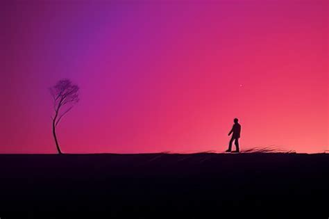 Premium AI Image | silhouette of a man walking in front of a tree at sunset