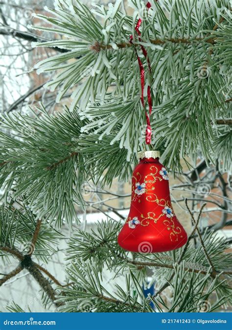 A Christmas Decorations on a Snowy Christmas Tree Stock Image - Image ...