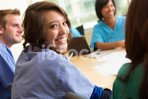 Cute Nursing Student With Friends In Medical School Study Group Stock ...