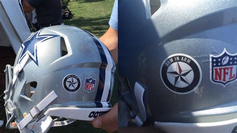 Cowboys honor Dallas police with helmet decal, walk arm-in-arm onto ...