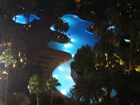 The Mirage Las Vegas Pool lit up at night -- so beautiful! | Mirage las ...