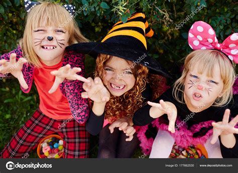 Scary Halloween Girls Costumes Trying Frighten You Stock Photo by ©pressmaster 177662530