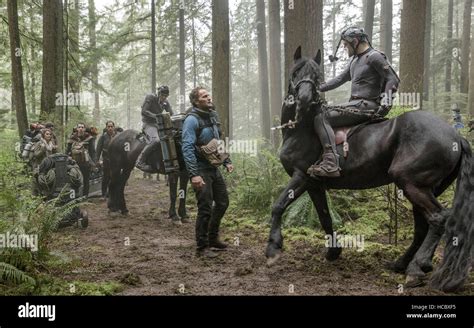 DAWN OF THE PLANET OF THE APES, Jason Clarke (center), Andy Serkis (right), 2014. ph: David ...