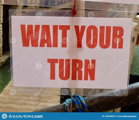 Wait Your Turn Sign in Red Lettering Stock Image - Image of business, signalise: 164548447