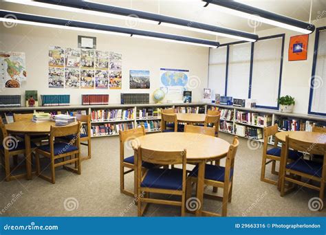 Table And Chairs Arranged In High School Library Royalty Free Stock ...