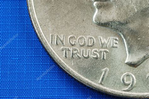 In God We Trust from the dollar coin isolated on blue — Stock Photo © johnkwan #3554211