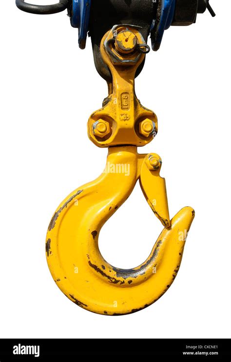 Yellow crane hoist hook with safety latch Stock Photo - Alamy