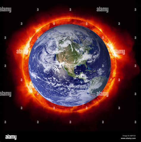 Earth planet fire burn burning concept heat hi-res stock photography and images - Alamy