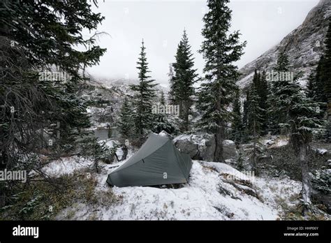 Camping tent in snowy landscape Stock Photo - Alamy