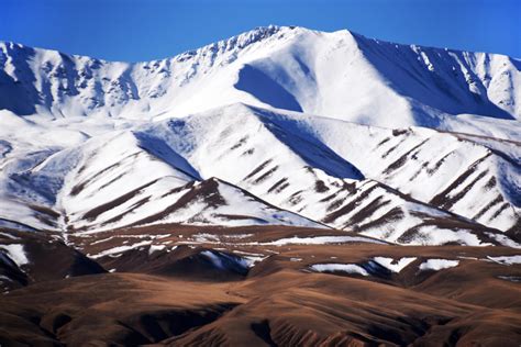 Kyrgyzstan revisited - snow-covered mountains by wildplaces on DeviantArt