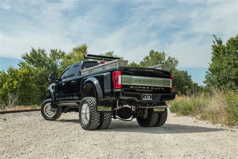 rear angle of a lifted 4x4 ford f-450 super duty platinum with massive ...