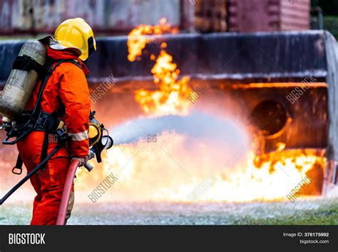 Firefighter Using Image & Photo (Free Trial) | Bigstock