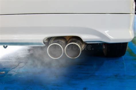 Car exhaust smoke stock photo. Image of closeup, chrome - 138557508