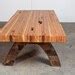 reclaimed wood bolted slab coffee table.