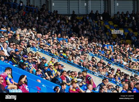 Warrington Wolves fans during the game Stock Photo - Alamy