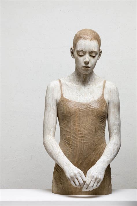 Lifelike Wood Sculptures of Pensive Men and Women