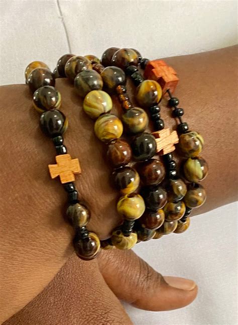 1 Rosary Bracelet with a wooden cross – www.immaculee.com