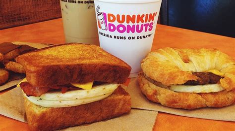 The Rarely Known Dunkin' Employee Rule About Breakfast Sandwiches