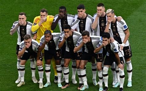 German players cover mouths to protest LGBT armband ban at World Cup | The Times of Israel