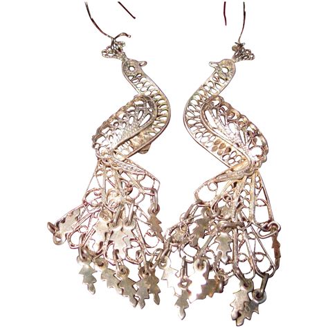 Silver Peacock Dangle Earrings in 2020 | Dangle earrings, Earrings, Dangles