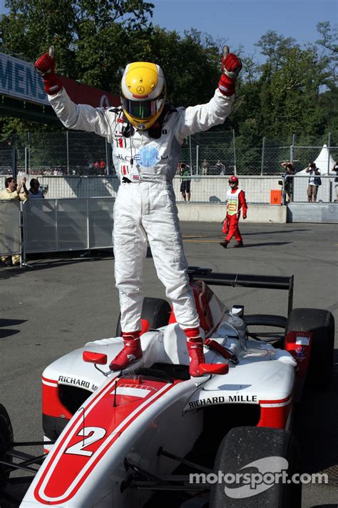 GP2 Series champion Lewis Hamilton celebrates at Monza