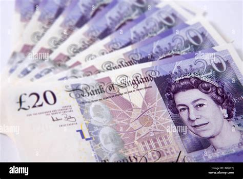 "twenty pounds" note "twenty pound" notes money sterling currency bundle stack Stock Photo - Alamy