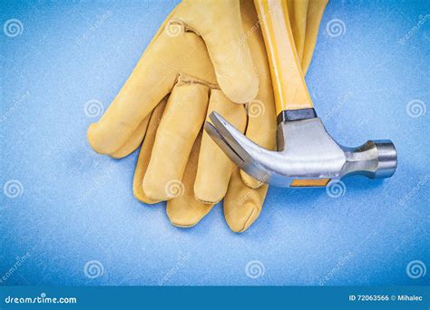 Set of Claw Hammer Safety Gloves on Blue Background Construction Stock Photo - Image of plastic ...