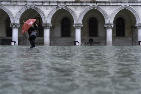 VENICE, ITALY - November 24, 2019: St. Marks Square Piazza San Marco during Flood Acqua Alta in ...