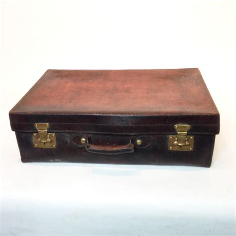 Dark Brown Stained Leather Vintage Suitcase | LONDON PROP HIRE