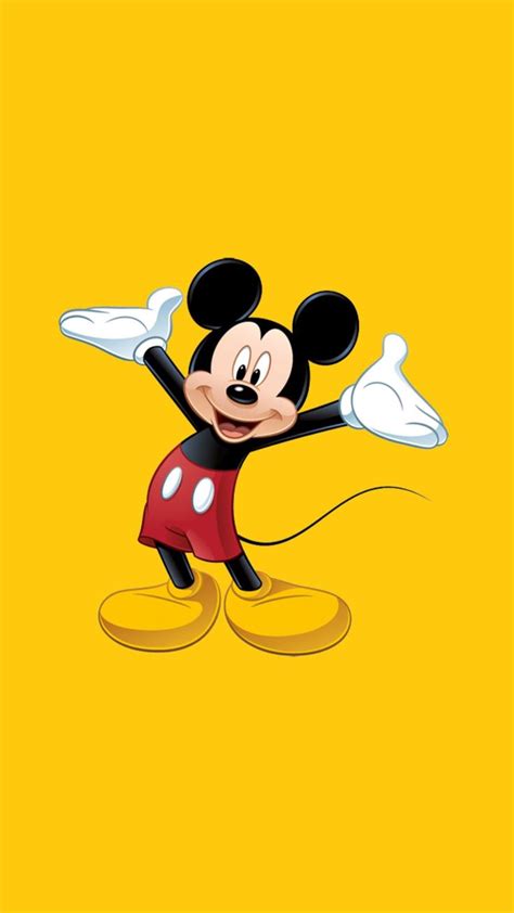 the mickey mouse character is dancing with his arms out and eyes wide ...