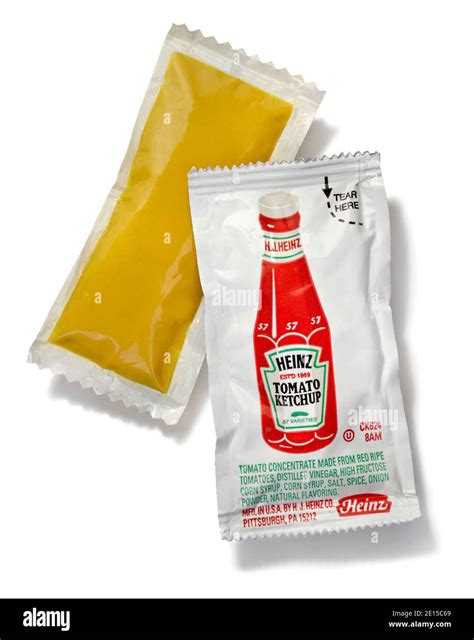 Heinz tomato ketchup packet Cut Out Stock Images & Pictures - Alamy