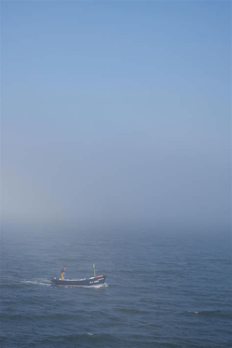 A Fishing Boat on the Sea · Free Stock Photo