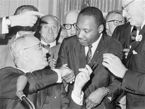 us-president-lyndon-johnson-l-shakes-hands-with - Martin Luther King Jr ...