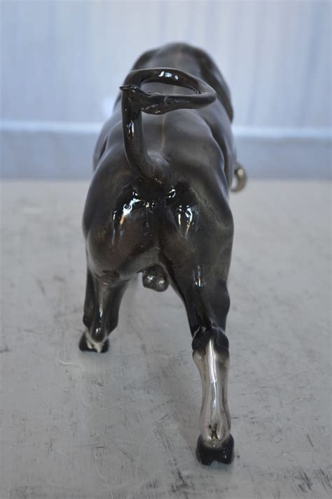 Charging Bull Bronze Statue - Size: 15"L x 5"W x 8"H. - NiFAO